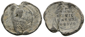 PB Byzantine lead seal (AD 11th century)
Obv: Bust of a saint (St. Nicholas?) blessing and holding book. Illegible inscription. Border of dots.
Rev:...