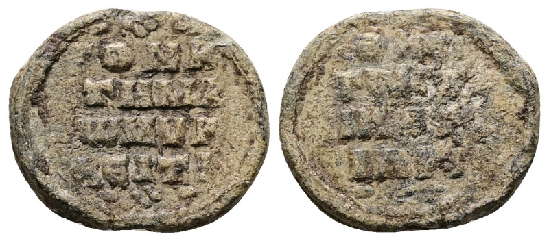 PB Byzantine seal (AD 11th century)
Obv: Inscription of four lines.
Rev: Inscrip...