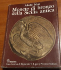MINI’ A. – Monete di bronzo della Sicilia antica. Palermo, 1979. pp. 505, Cartonato con sovracoperta, moltissime ill. b. n. e ingrandimenti col. Volum...