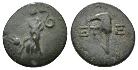 PISIDIA, Etenna. 1st century BC. Æ (17mm, 3.5 g). Nymph advancing right, head left, holding coiled serpent; amphora to left / Curved knife. ETE.