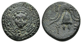 Kings of Macedon. Salamis. Philip III Arrhidaeus 323-317 BC. 1/2 Unit AE (16mm, 4.5 g). Macedonian shield, with facing gorgoneion on boss / B-A, helme...