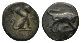 Caria. Kaunos circa 300-250 BC. Bronze Æ (12mm, 1.6 g). K-A, sphinx seated right. / Bull butting right on ground line.