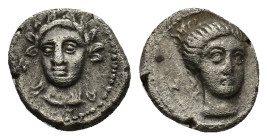 CILICIA, Nagidos. Circa 400-380 BC. AR Obol (10mm, 0.8 g) Wreathed head of young Dionysos facing slightly left. Rev: Head of Aphrodite facing slightly...