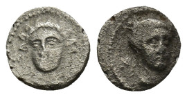 CILICIA, Nagidos. Circa 400-380 BC. AR Obol (8mm, 0.5 g) Wreathed head of young Dionysos facing slightly left. Rev: Head of Aphrodite facing slightly ...