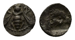 Ionia, Ephesos AR Tetartemorion. (6mm, 0.1 g) Circa 500-420 BC. Bee / EΦ to right, head of eagle right within incuse square.