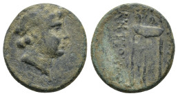 SELEUKID KINGS OF SYRIA. Antiochos II Theos (261–246 BC). AE. (3.9 Gr. 17mm.) 
 Laureate head of Apollo right. 
Rev: BAΣΙΛΕΩΣ ANTIOXOY. Tripod; monogr...