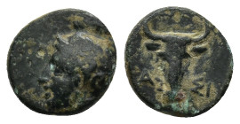 TROAS. Assos. 4th-mid 3rd century BC. AE (1.1 Gr. 10mm.)
Head of Athena to right, wearing crested Attic helmet.
 Rev. Facing head of a bull; above ΑΣ ...