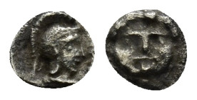 Pisidia Selge. Ca. 350-300 B.C. AR Tetartemorion (0.1 Gr. 5mm)
 Facing gorgoneion 
Rev. Helmeted head of Athena right.