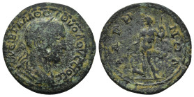 LYDIA. Bagis. Volusian. 251-253 AD. Æ (24mm, 6.9 g). Laureate, draped and cuirassed bust right / Dionysos standing left, holding kantharos over panthe...