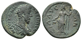 PAMPHYLIA, Sillyum. Commodus. AD 177-192. Æ (19mm, 4.3 g) Laureate, draped and cuirassed bust right, seen from behind / Dionysos standing left, pourin...