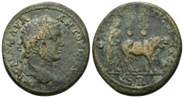 Pisidia Antiochia. Caracalla 198-217. AE ( 25.7 Gr. 38mm.)
Laureate bust right,
Rev. Soldier-settler plowing with yoke of oxen, two standards behind...