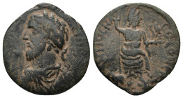 Pisidia, Antiochia. Commodus. A.D. 177-192. Æ (21mm, 4.1 g). Laureate, draped and cuirassed bust of Commodus left / Mên standing right, resting foot o...