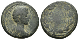 COMMAGENE. Doliche. Commodus (?) (166-177). AE. (8.9 Gr. 22mm.)
 Laureate, draped and cuirassed bust right. 
Rev. Legend in three lines within wreath....