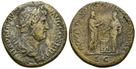 Hadrian (AD 117-138). AE Sestertius (27.9 Gr. 31mm). Rome. 
 Bare headed, draped bust of Hadrian right, seen from side 
Rev. Hadrian (on left), standi...