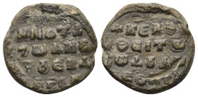 BYZANTINE LEAD SEALS. (20mm, 5.6 g) Obv: Legend four lines. Rev: Legend four lines.