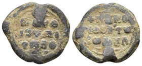 Byzantine Seal Lead (7.6 Gr. 20mm.)
 Legend three lines. 
Rev: Legend three lines.