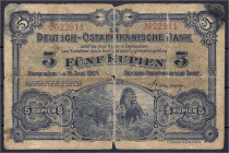 Banknoten der Kolonien und Nebengebiete
Deutsch-Ostafrika
5 Rupien 15.6.1905. Kolonialbanknote, Löwenpaar in der Savanne. V, oben rechts Brandspuren...