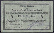 Banknoten der Kolonien und Nebengebiete
Deutsch-Ostafrika
5 Rupien Interims-Banknote 1.11.1915, Karton hellgraugrün mit blauen Fasern. Serie D. II, ...