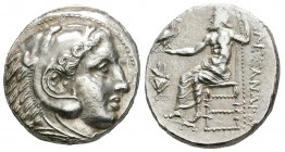 Imperio Macedonio. Alejandro III Magno. Tetradracma. 323-317 a.C. Pella. (Price-206b). (Müller-856). Anv.: Cabeza de Heracles a derecha recubierta con...