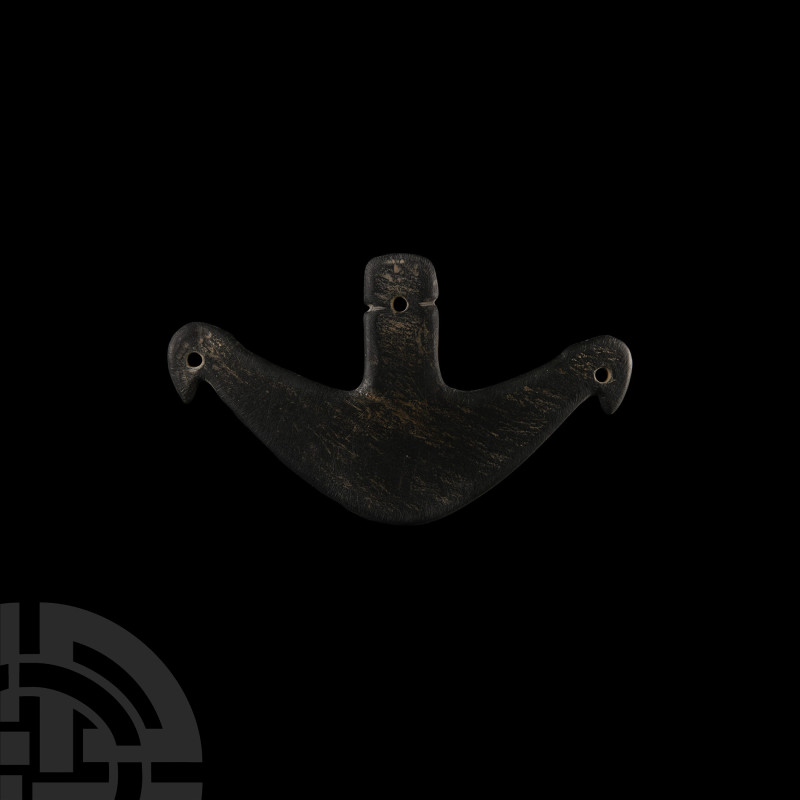 Egyptian Schist Double Bird Palette
Predynastic Period, circa 3500 B.C. The cre...