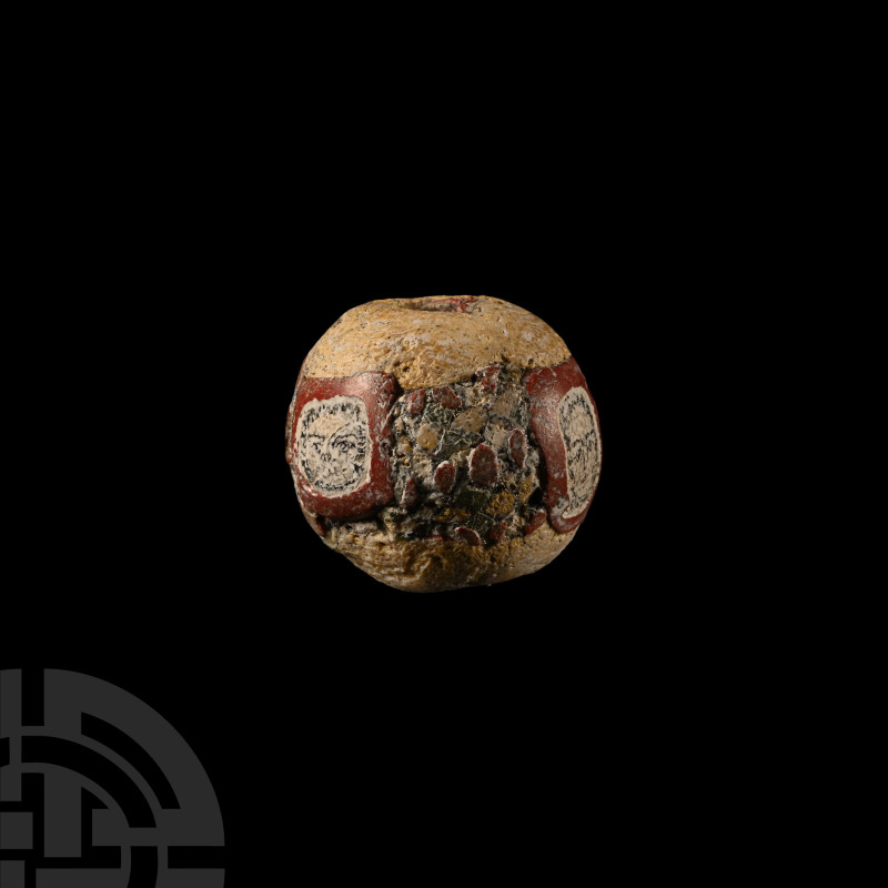 Romano-Egyptian Glass Millefiori Face Bead
Circa 1st century A.D. Spherical in ...
