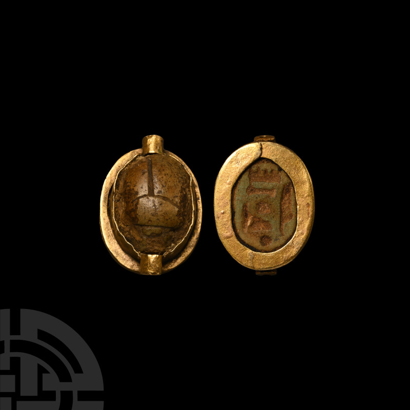 Egyptian Gold Mounted Hardstone Scarab
New Kingdom, 1550-1070 B.C. The scarab w...