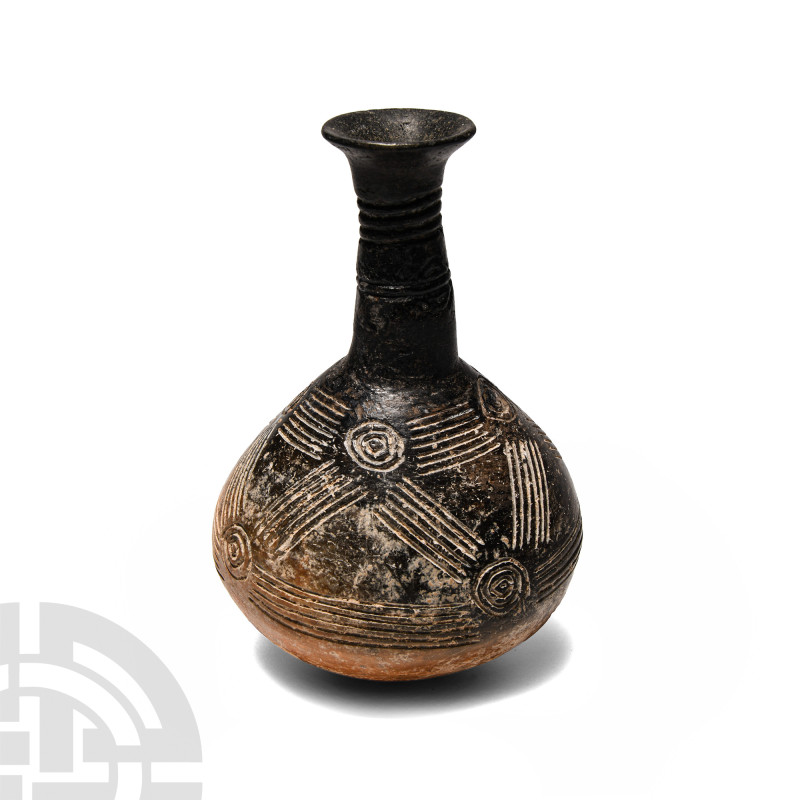 Early Cypriot Terracotta Bottle
Bronze Age, circa 2300-1650 B.C. Black burnishe...