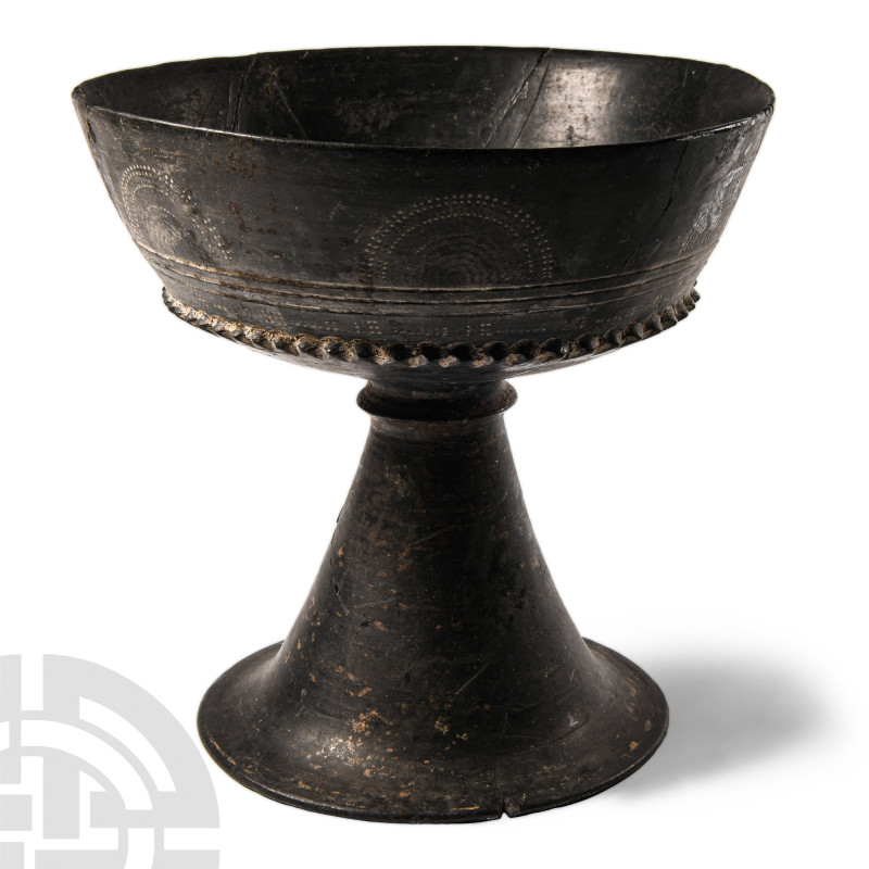 Etruscan Bucchero Chalice with Decoration
Circa 7th century B.C. The carinated ...