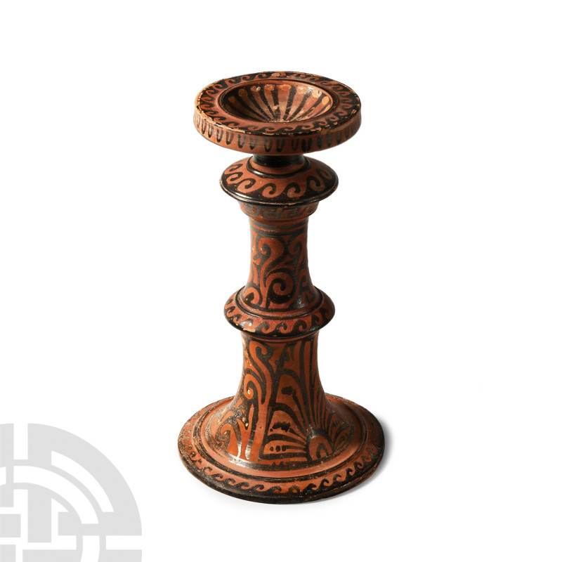 Greek Apulian Red-Figure Stand
4th century B.C. Comprising a trumpet-shaped bas...