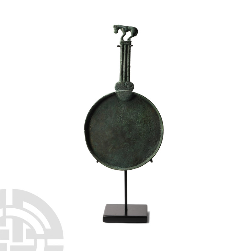 Scythian Bronze Mirror with Panther Handle
5th-4th century B.C. Comprising a di...