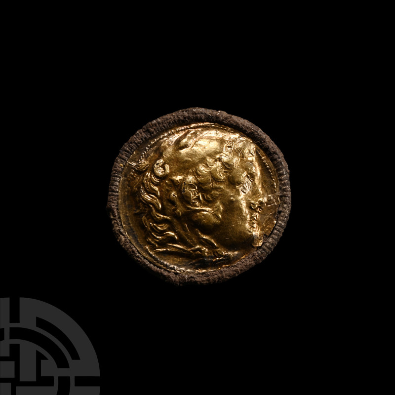 Greek Gold-Foiled Alexander the Great Coin Brooch
Circa 3rd century B.C. Compri...