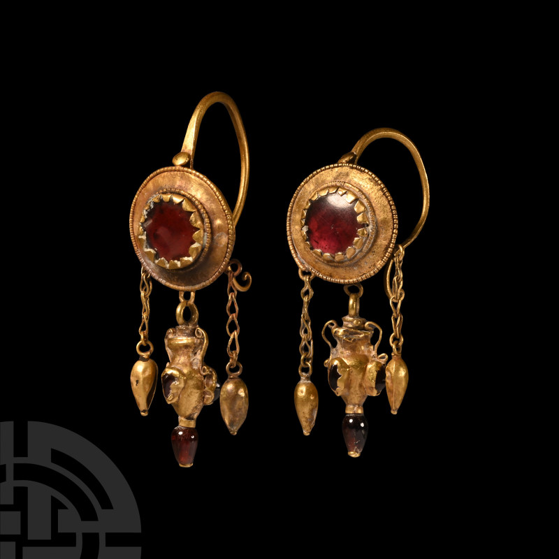 Greek Gold Earrings with Amphora Drops
Circa 2nd century B.C. Each composed of ...