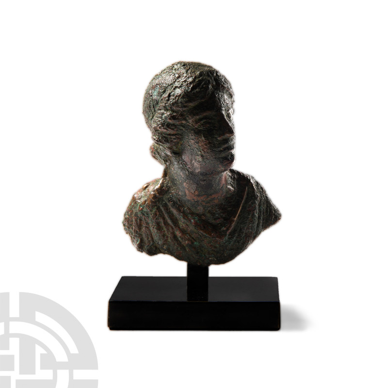 Roman Bronze Bust of a Noble Lady
2nd century A.D. Modelled in the round with s...