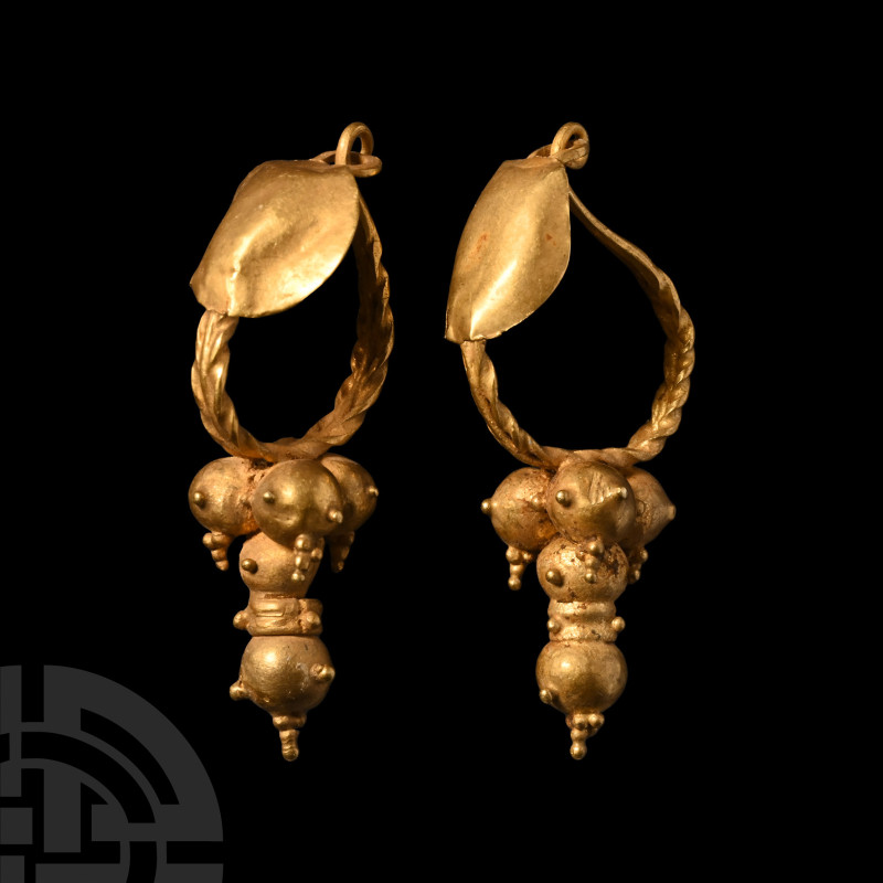 Roman Gold Boss Earrings
2nd-3rd century A.D. Each composed of a central slende...