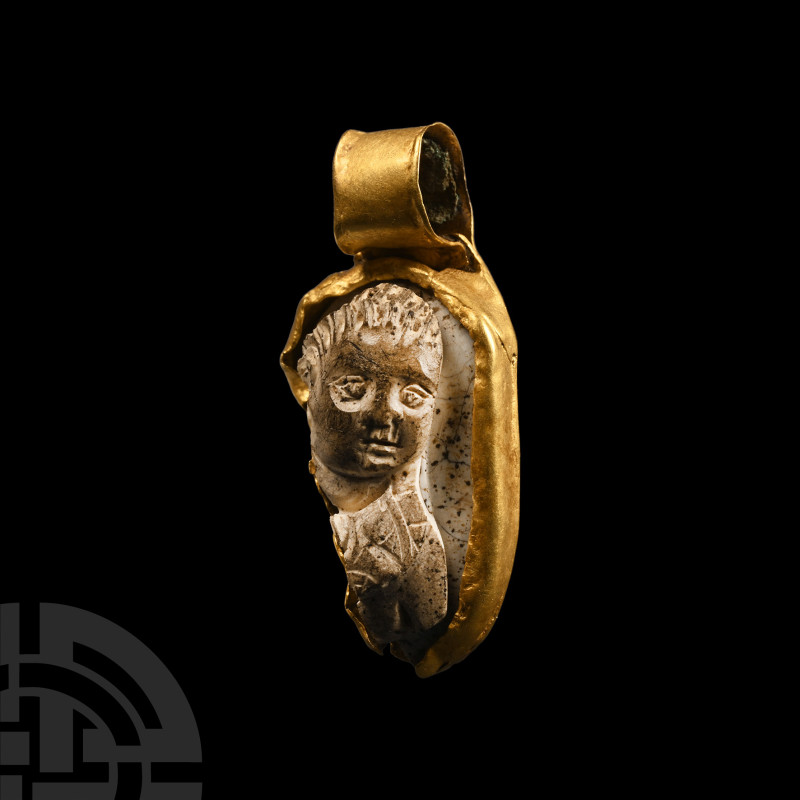 Roman Gold Pendant with Cameo
Circa 1st-2nd century A.D. Suspension loop to one...