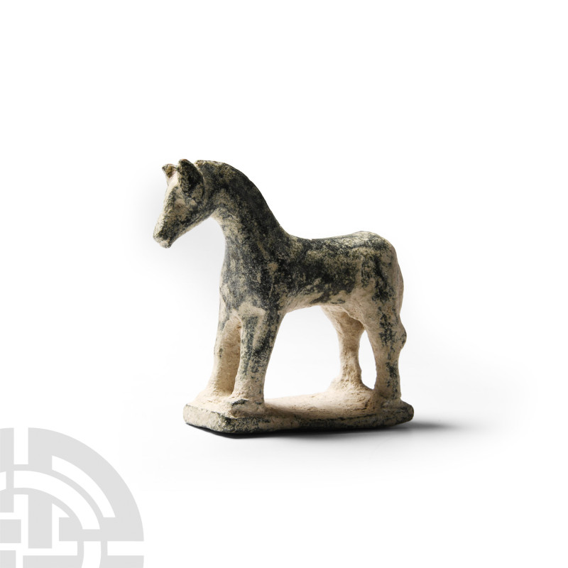 Roman Bronze Horse
2nd-3rd century A.D. Modelled standing on a rectangular base...