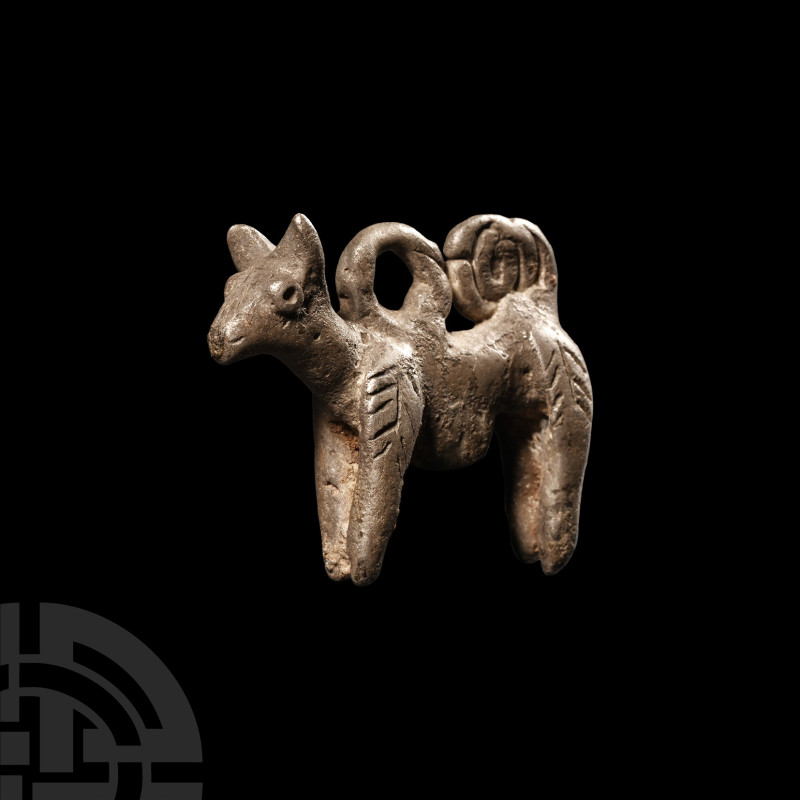 Western Asiatic Silver Animal Statuette
1st millennium A.D. Formed in the round...
