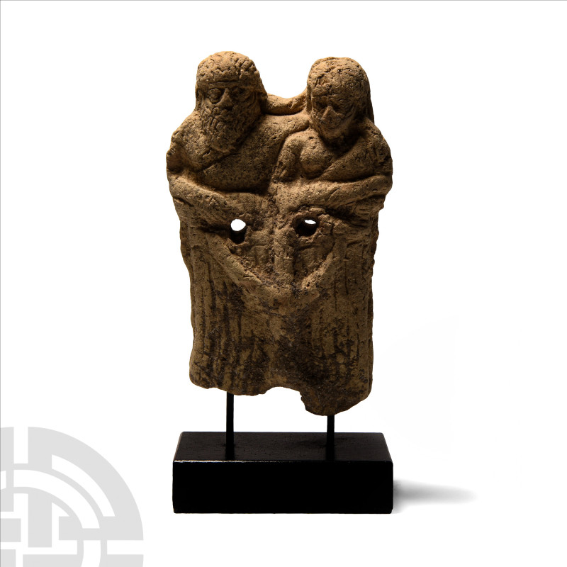 Old Babylonian Terracotta Couple
Circa 2000 B.C. Modelled in the half-round as ...