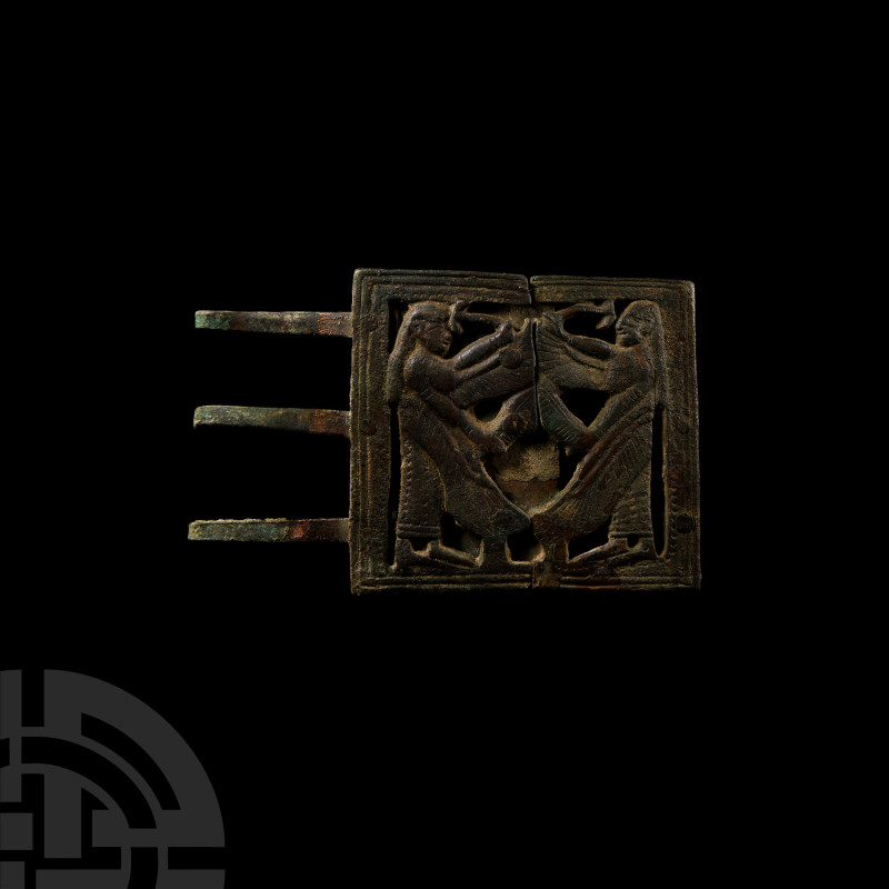 Neo-Assyrian Bronze Two-Piece Belt Buckle with Winged Genii
9th-7th century B.C...