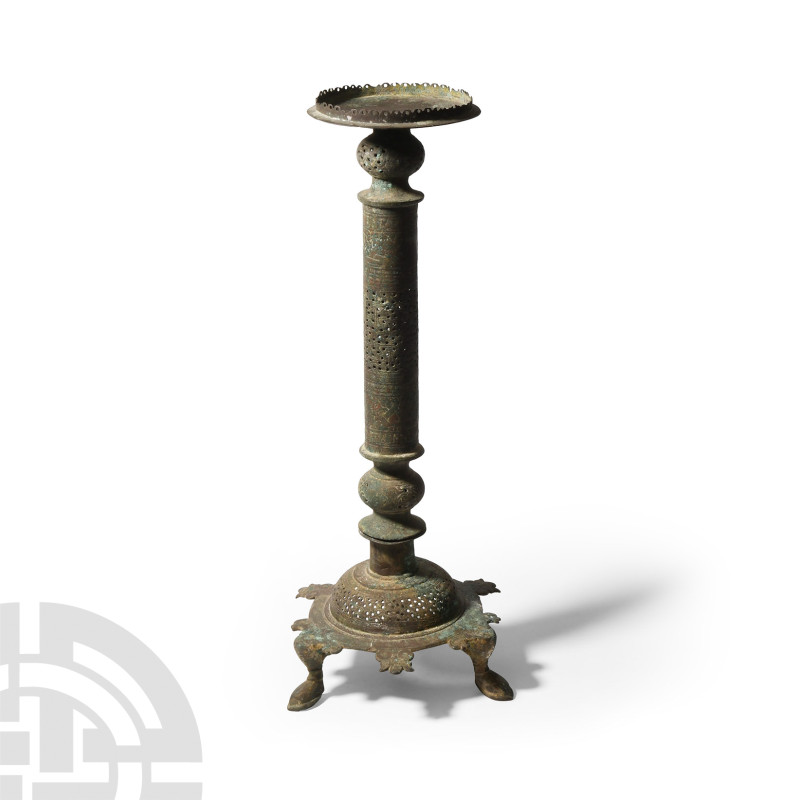 Western Asiatic Bronze Openwork Lamp Stand
Circa 12th century A.D. Hollow-forme...