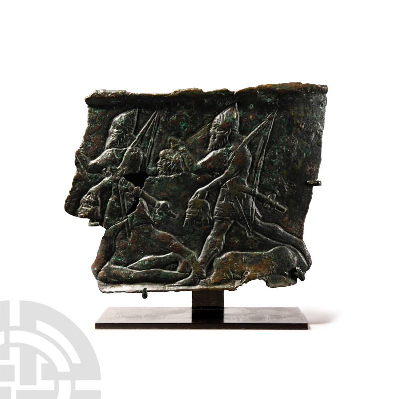 Assyrian Bronze Relief Fragment
Circa 9th century B.C. Displaying a corrugated ...