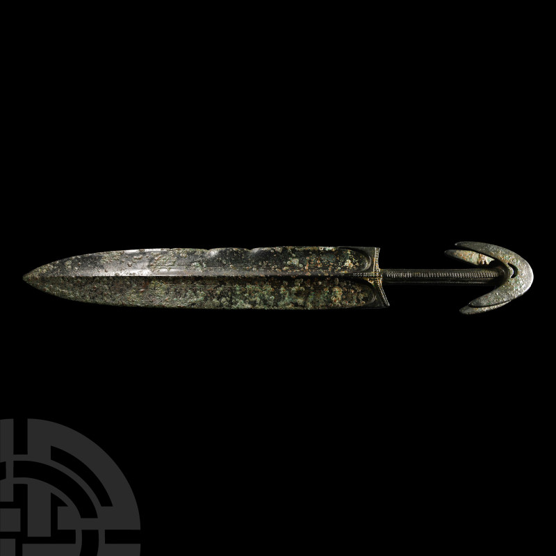 Amarlu Type Bronze Short Sword
Late 2nd millennium B.C. Composed of a massive t...
