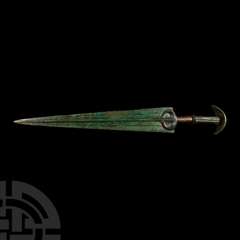 Marlik Bronze Short Sword with Crescentic Pommel
14th-10th century B.C. Formed ...