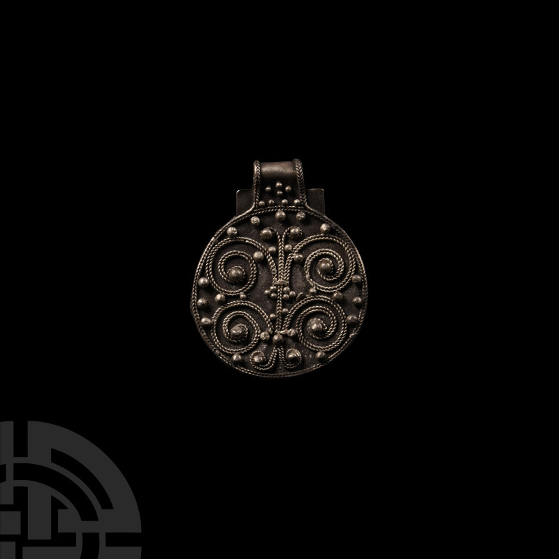 Viking Age Silver Filigree Pendant
9th-11th century A.D. Flat disc with integra...
