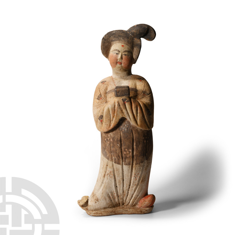 Chinese Tang Terracotta Courtly Lady
Tang Dynasty, 618-907 A.D. Modelled standi...