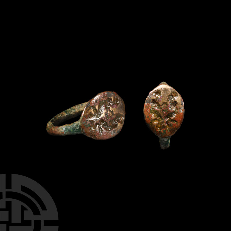 Greek Bronze Ring with Figures
4th-2nd century B.C. Composed of a hoop with con...
