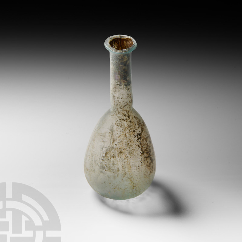 Roman Glass Unguentarium
2nd century A.D. Piriform with slender tubular neck an...