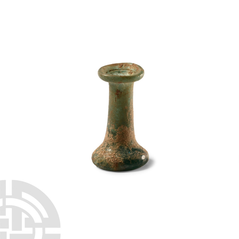 Roman Green Glass Cotton Reel Type Unguentarium
1st-2nd century A.D. Broadly sp...
