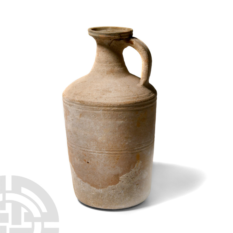 Roman Terracotta Vessel
1st-4th century A.D. Of cylindrical form with gusseted ...