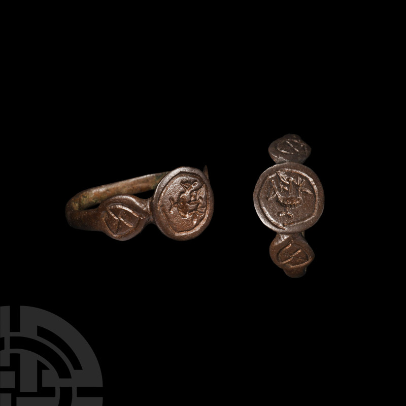 Roman Bronze Ring with Bird
3rd-4th century A.D. Large disc bezel with standing...